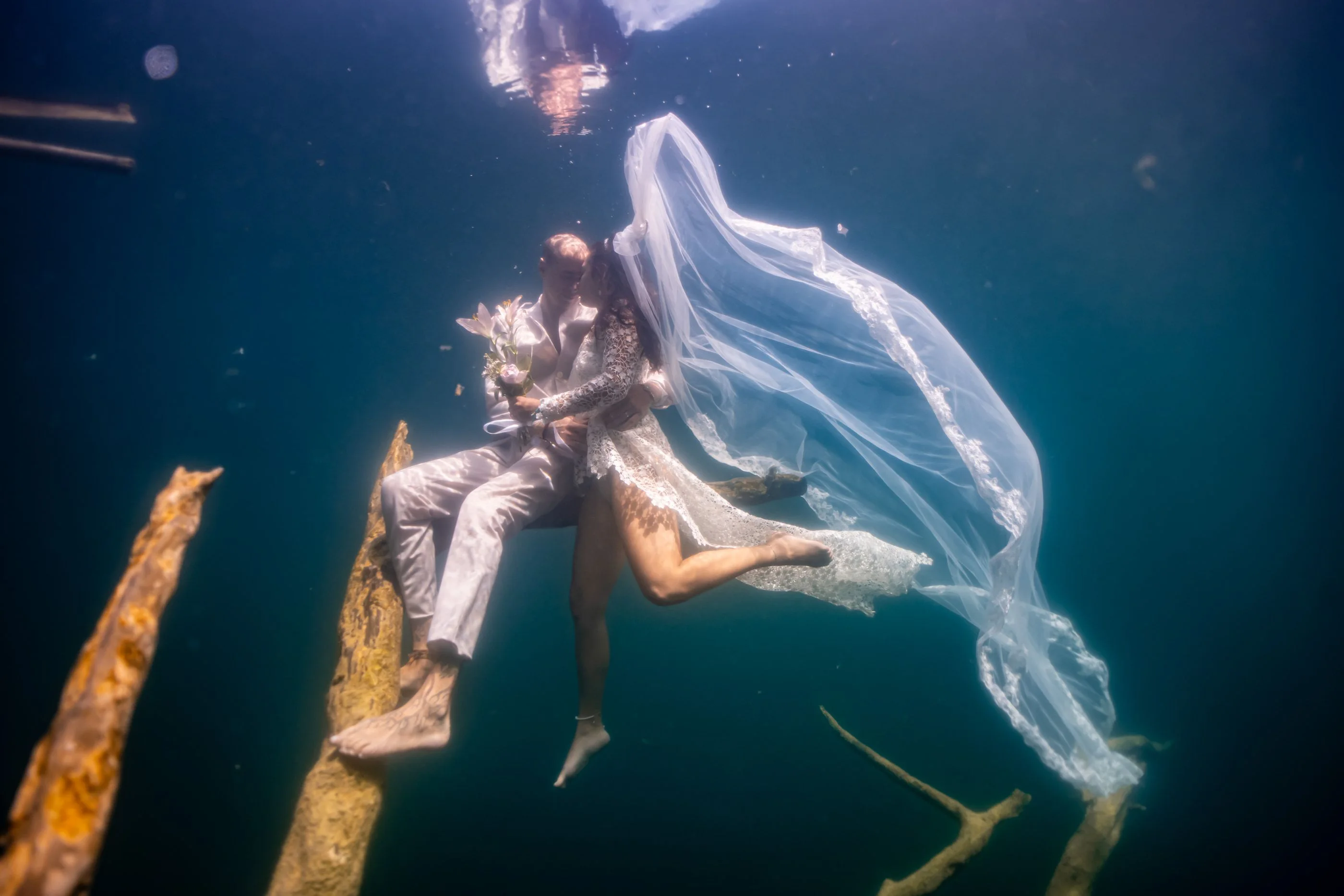 Figure suspended in a shaft of cenote light