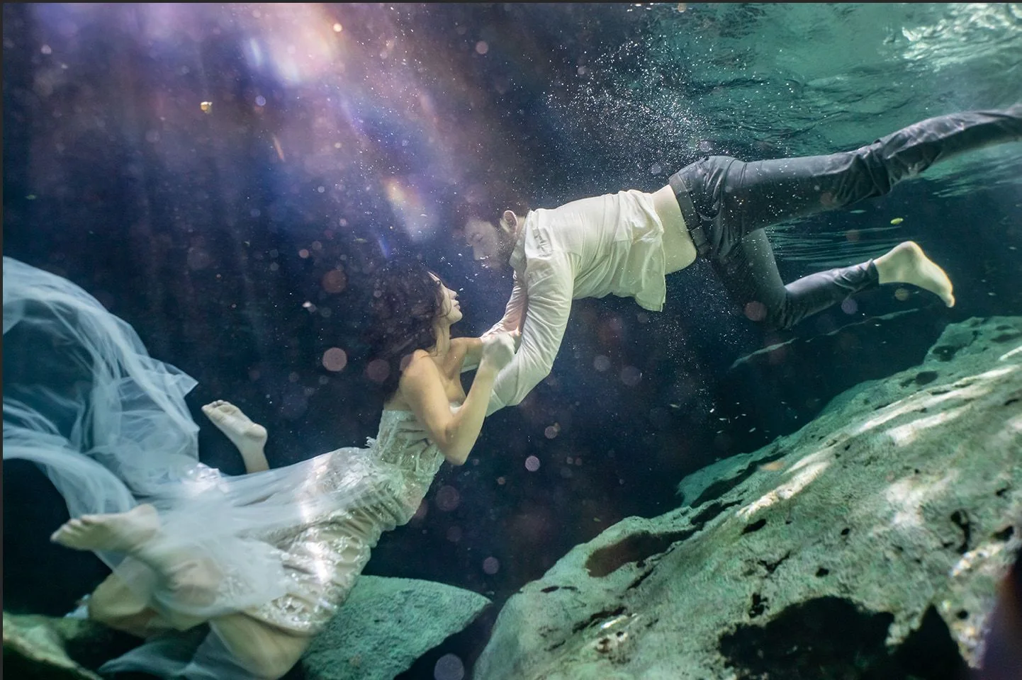 A couple meeting in cool, deep water